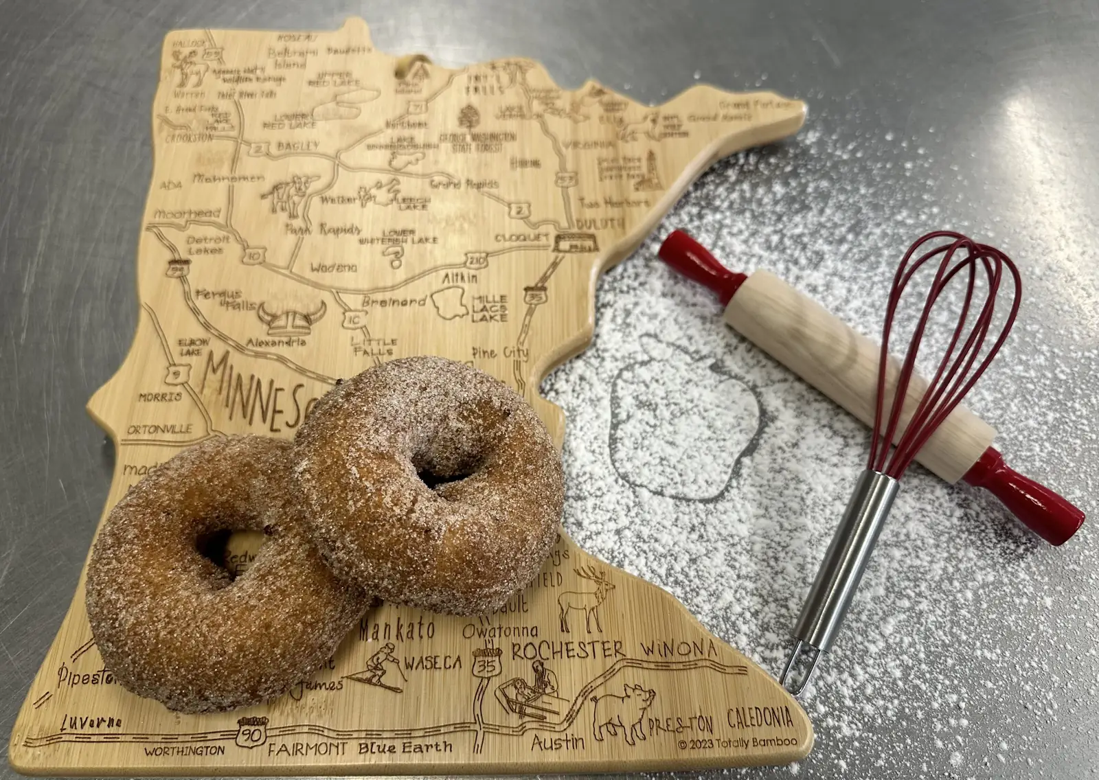 Aamodt's apple cider donuts on a Minnesota-shaped cutting board